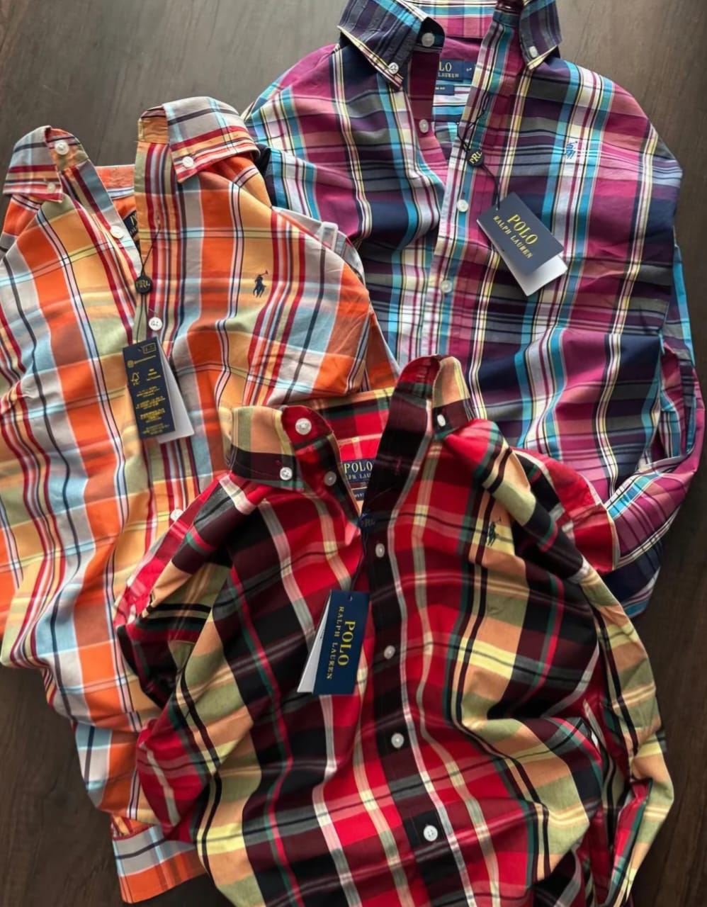 Set of three men's check shirts in various colors from 18893, featuring casual and stylish design suitable for everyday wear.