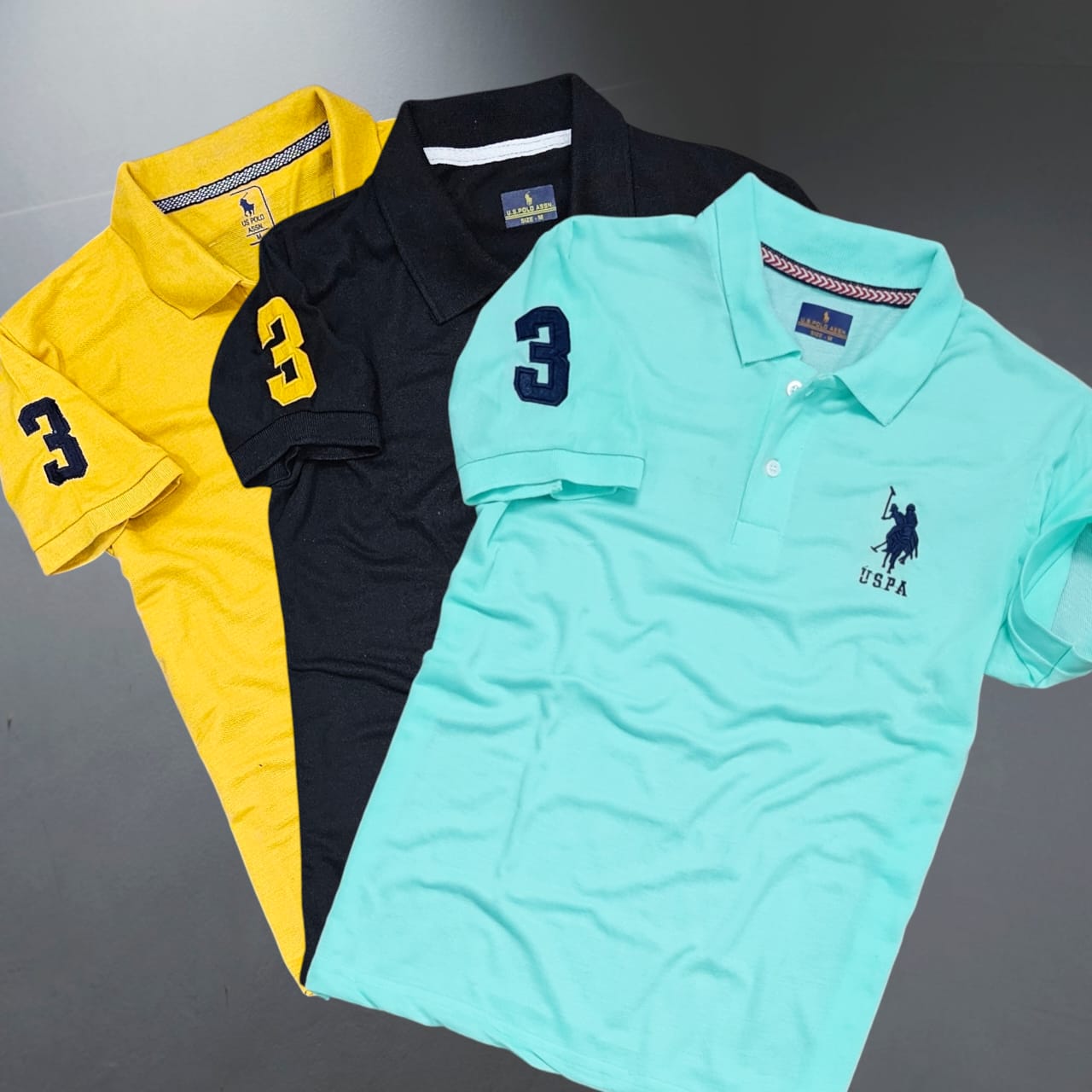 Set of three multicolor men's polo neck T-shirts by 18893, casual short-sleeve shirts for men, size M.
