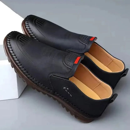 Black men's casual shoes from 18894, featuring a comfortable slip-on design and stylish casual look.