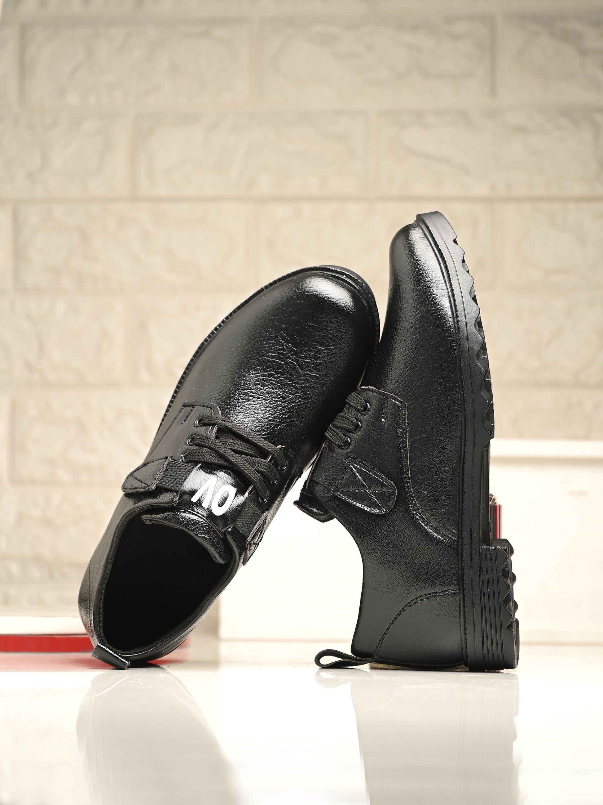 Black men's casual shoes by 18894, featuring a sleek design, comfortable fit, and stylish appearance for everyday wear.