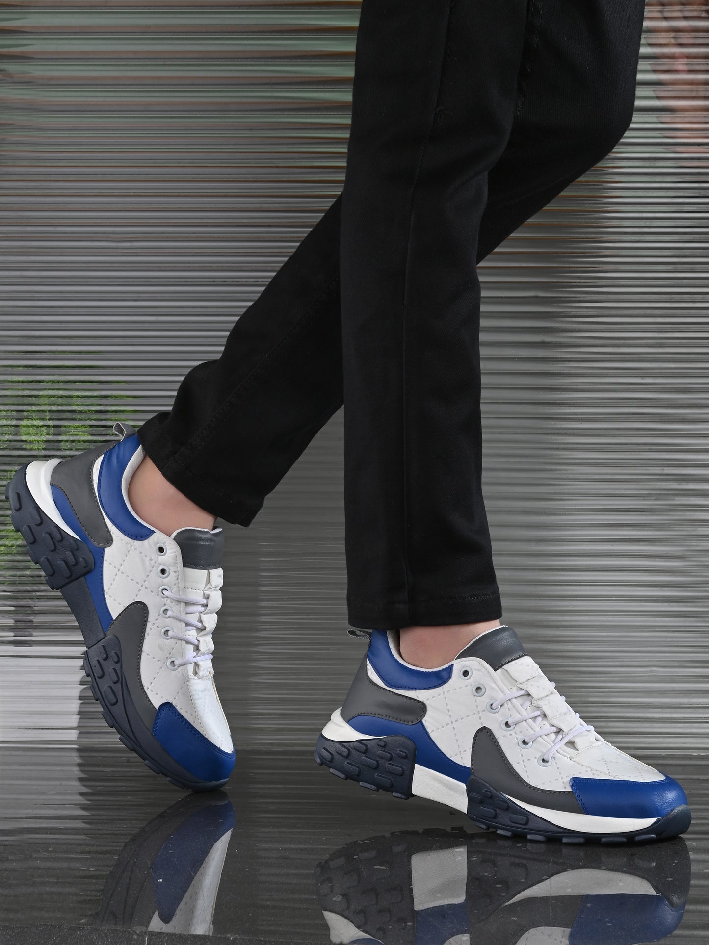 White men's casual sneaker shoes by 18894, featuring a sleek design and comfortable fit, shown in a close-up image.