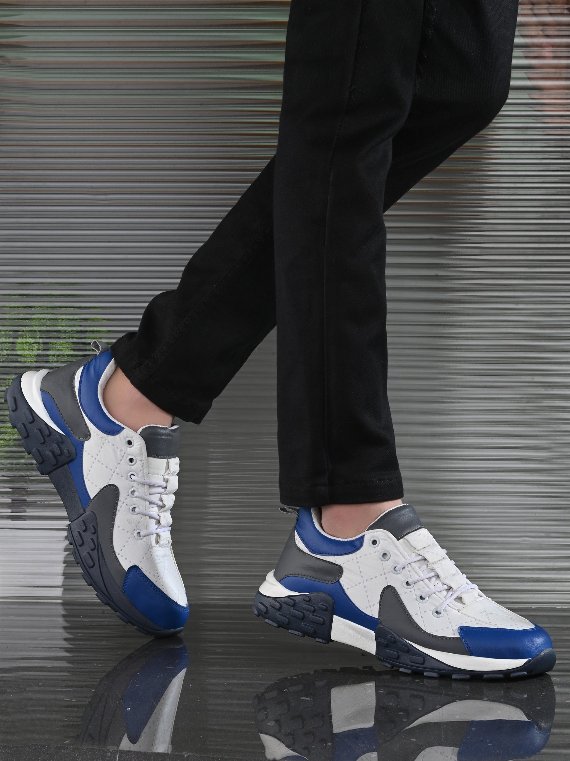 White men's casual sneaker shoes by 18894, featuring a sleek design and comfortable fit, shown in a close-up image.