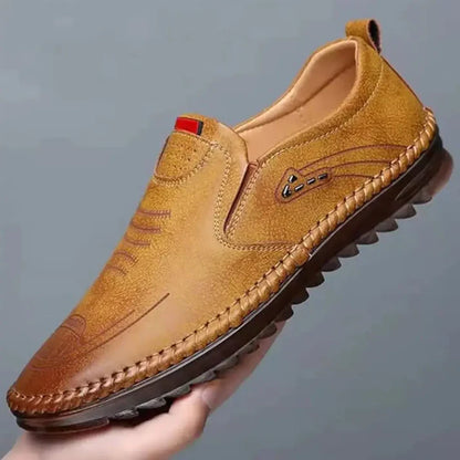 Beige men's casual leather shoes with a sleek, comfortable design, perfect for everyday wear.