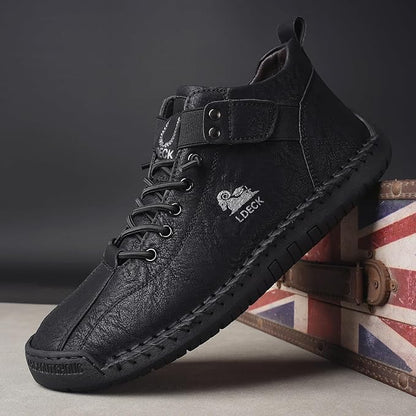 Men's casual black boots from 18894, featuring a sleek leather design and sturdy sole for everyday wear.