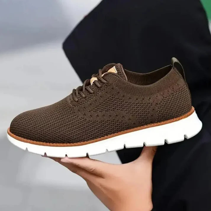 Brown mesh men's casual shoes from 18894 featuring breathable material and comfortable slip-on design.