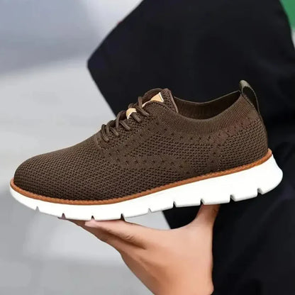 Brown mesh men's casual shoes from 18894 featuring breathable material and comfortable slip-on design.