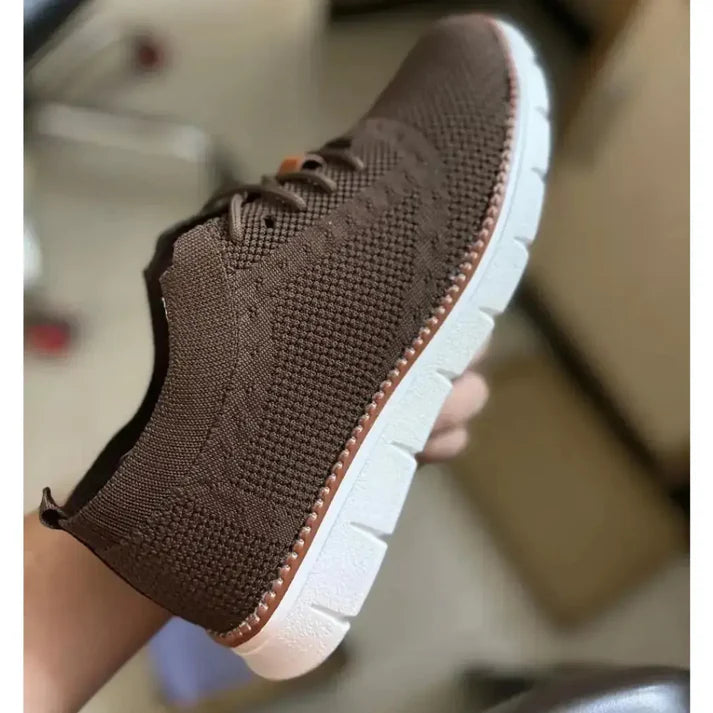 Brown mesh men's casual shoes by 18894, featuring a comfortable slip-on design and stylish casual footwear for everyday wear.
