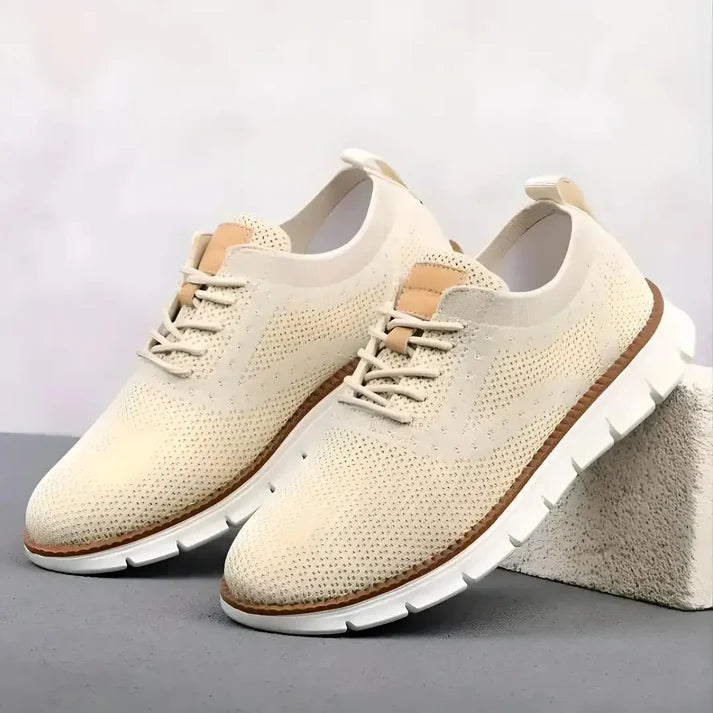Tan mesh men's casual shoes by 18894, featuring breathable fabric and comfortable slip-on design.