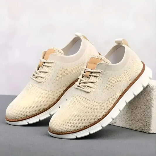 Tan mesh men's casual shoes by 18894, featuring breathable fabric and comfortable slip-on design.