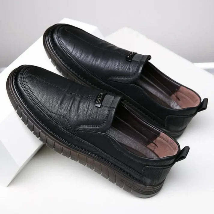 Black leather men's formal shoes by 18894, showcasing sleek design and polished finish suitable for business or formal wear.
