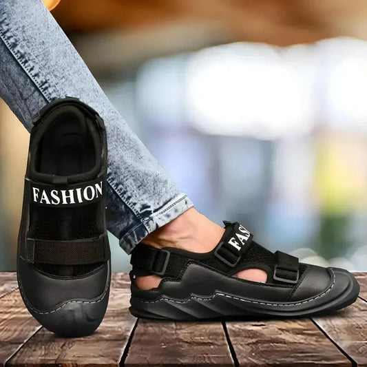 Black leather men's sandal from 18894 with adjustable straps and cushioned sole, perfect for casual summer wear.