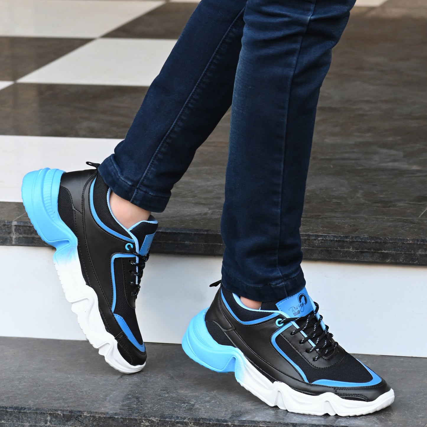 Blue men's sports shoes by 18894 with breathable mesh upper and cushioned sole, perfect for running and athletic activities.