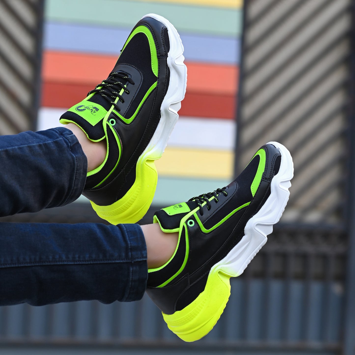 Green men's sports shoes by 18894 with breathable mesh upper and sporty design, ideal for running and active wear.