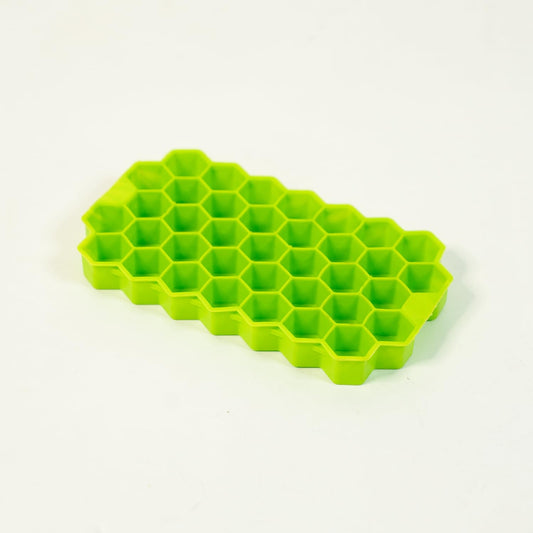 Kitchen4U silicone ice cube tray with 37 small, honeycomb-shaped ice cubes for whiskey and cocktails, flexible and easy to release.