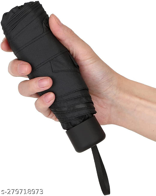 Black Kitchen4U windproof travel umbrella for rain, compact and sturdy, designed for easy handling and protection from rain.