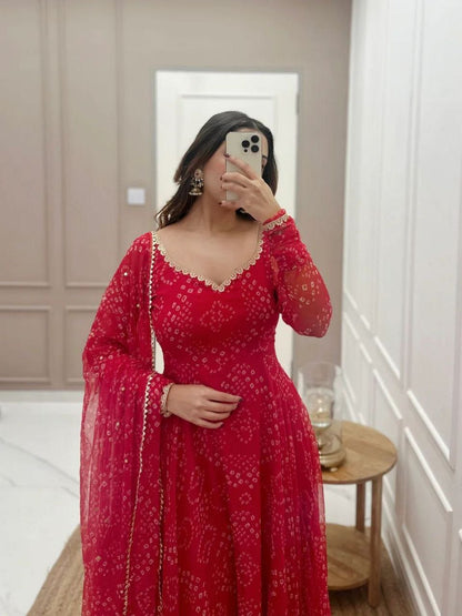Women’s red Bandhani styles gown by 19198, featuring traditional tie-dye pattern and elegant fit, shown on a model.