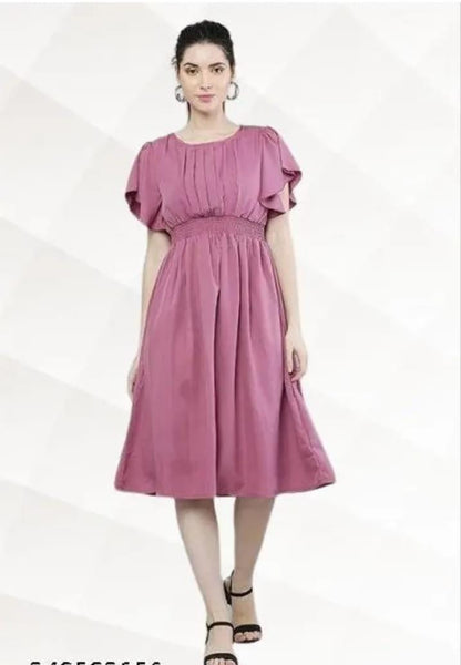 Women’s pink solid viscose rayon fit and flare gown, free size, stylish and comfortable, perfect for casual or semi-formal wear.