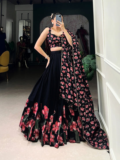Black women's Lehenga Choli with traditional and sparkly design, featuring intricate embroidery and fabric details.
