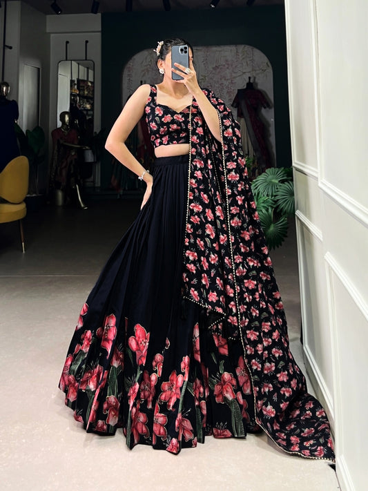 Black women's Lehenga Choli with traditional and sparkly design, featuring intricate embroidery and fabric details.