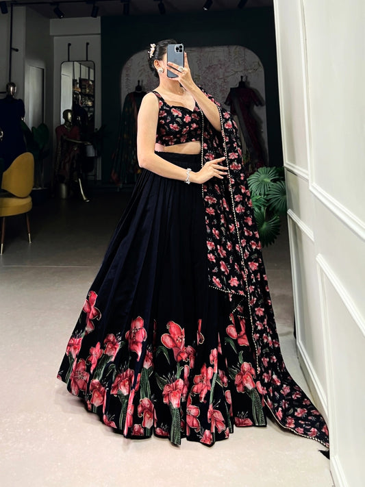 Black women's Lehenga Choli with traditional and sparkling design, featuring intricate embroidery and elegant fabric details.