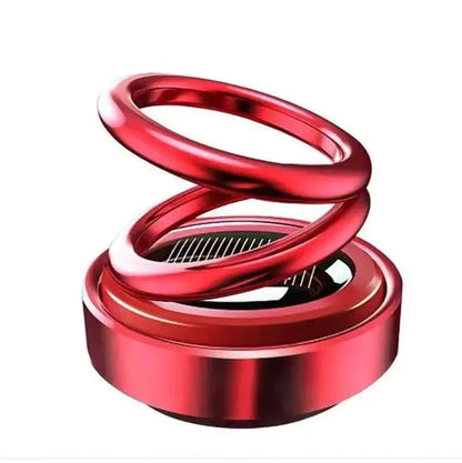 Metallic double spring solar perfume car sponge by 19357 with rotating dashboard design, offering a fresh scent and stylish car decor.