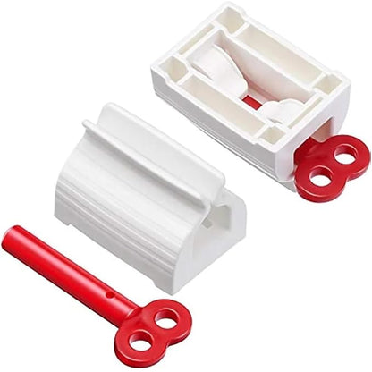 Set of four portable toothpaste dispensers by 19357, featuring manual rolling squeeze mechanisms for bathroom use.