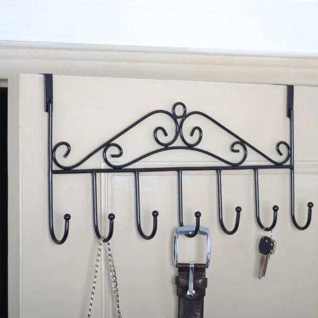 Heavy-duty metal door hanger with seven over-the-door hooks for towels, coats, and accessories, ideal for organizing spaces.