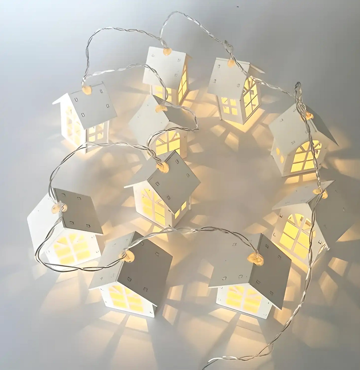 White home string lights for Diwali decorations, featuring soft glowing bulbs, ideal for festive home decor.