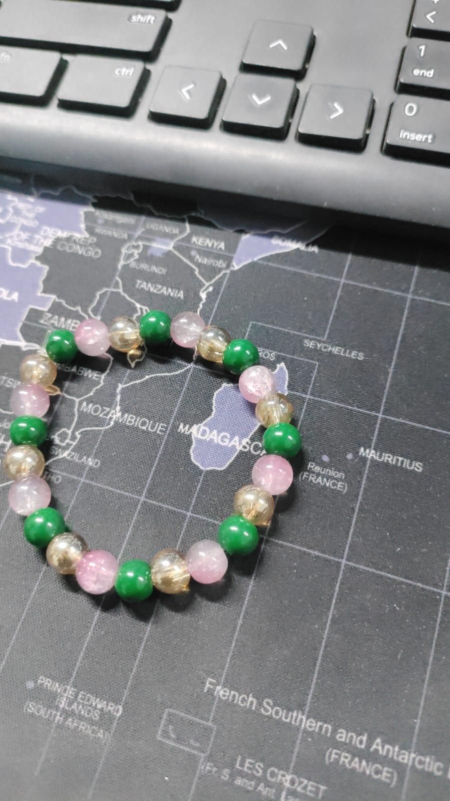 Pair of men's customised and energized bracelets from brand 19378, featuring unique designs and vibrant colors.