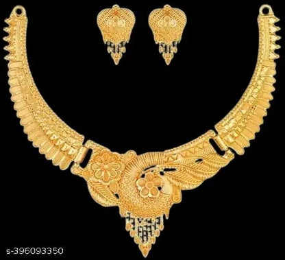 Gold women's jewellery set featuring intricate designs, including earrings and necklace, from the New Tready collection.
