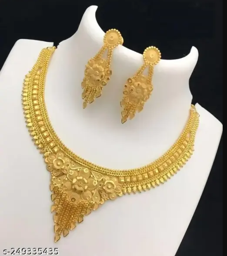 Gold plated women's jewellery set with matching necklace and earrings, featuring an elegant grand look design.