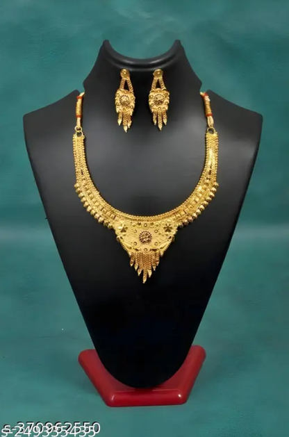 Gold plated women's jewellery set featuring a necklace and matching earrings with a grand look design.