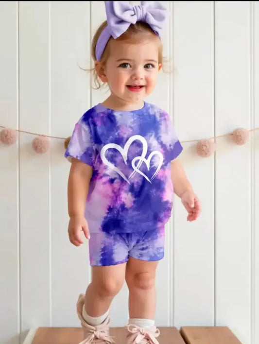 Kids tie-dye heart print summer set with purple and pink t-shirt and shorts by ekom, perfect for warm weather.