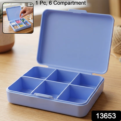 Wukusy 6-compartment plastic pill organizer box with portable medicine storage case, showing individual compartments and secure lid.