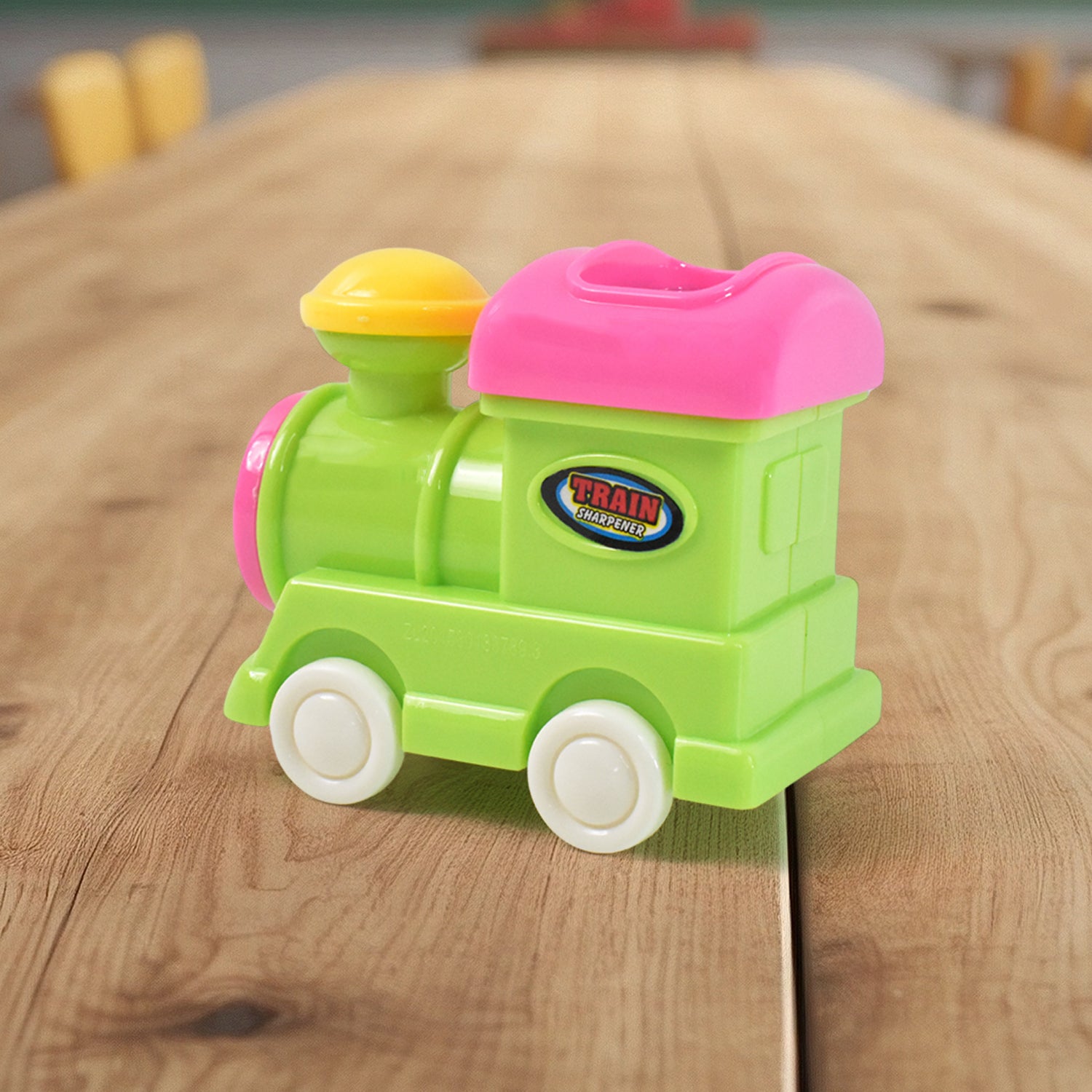 Wukusy train-themed double hole pencil sharpener for office use, featuring a colorful train design on a white background.
