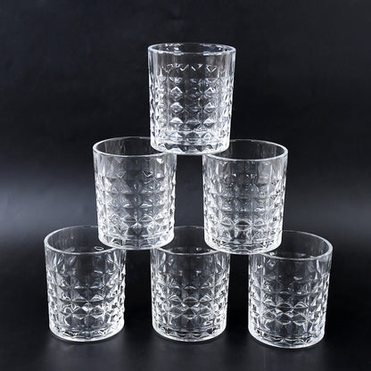 Six crystal-style glass tumblers with 210 ml capacity from Wukusy, arranged on a wooden surface.