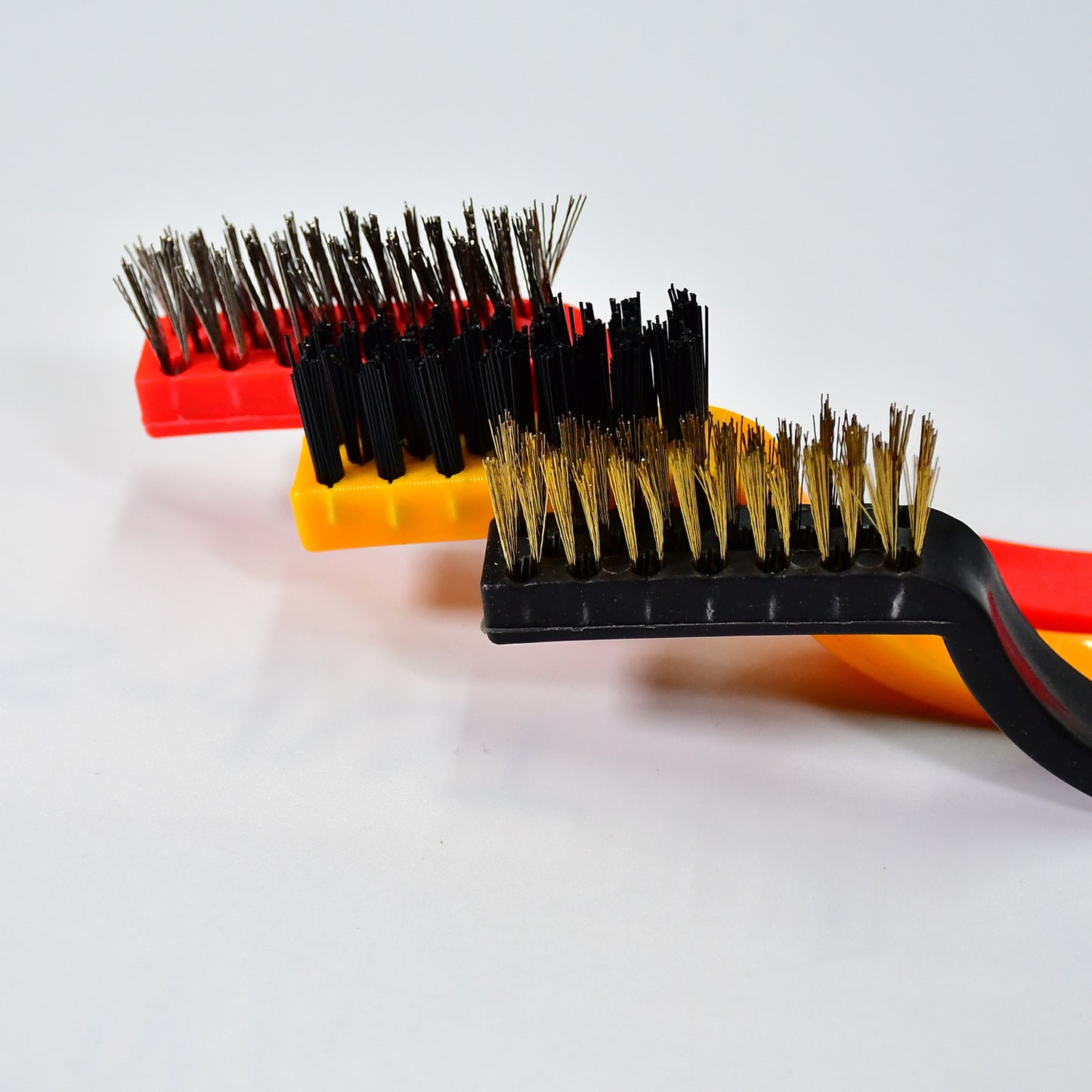 Wukusy 2166 3-piece mini wire brush set with brass, nylon, and stainless steel bristles for cleaning gas stoves, tiles, and rust removal.