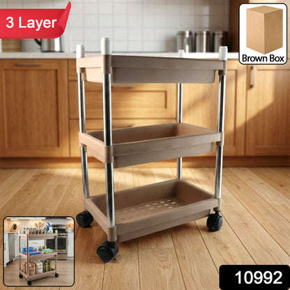Wukusy 3-layer multipurpose storage trolley with black metal frame and white plastic shelves for kitchen or home organization.