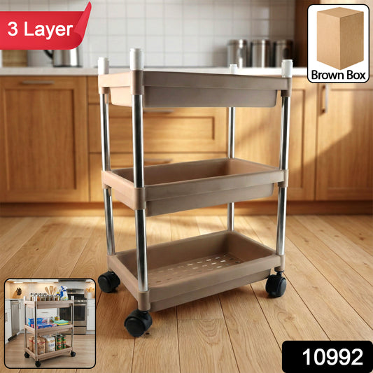 Wukusy 3-layer multipurpose storage trolley with black metal frame and white plastic shelves for kitchen or home organization.