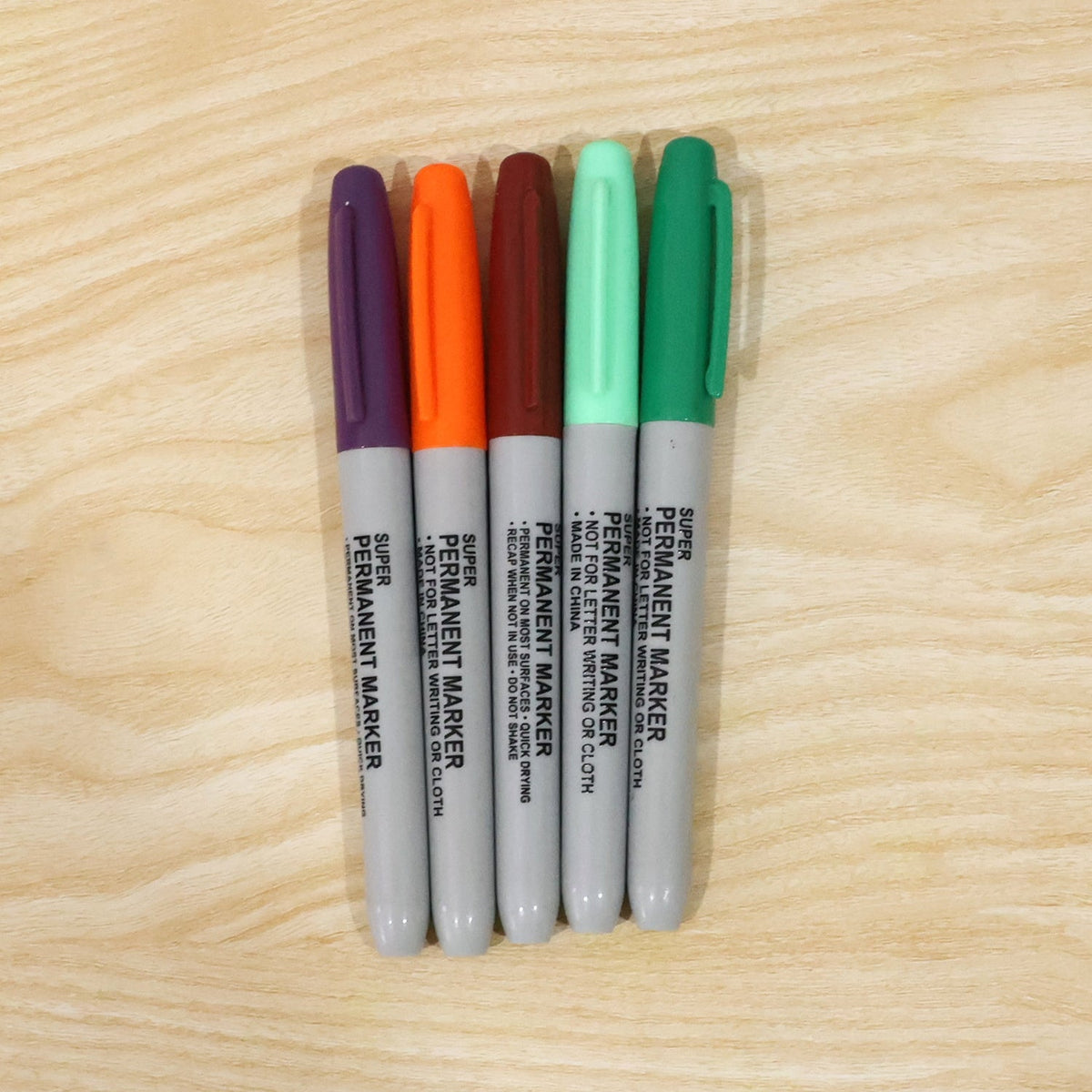 Wukusy mix color permanent marker pen waterproof quick dry for office and school, shown with colorful ink tips on white background.