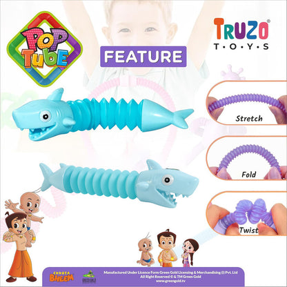 Wukusy shark-shaped magic spring toy stretched and ready to bounce, colorful plastic spiral toy on a white background.