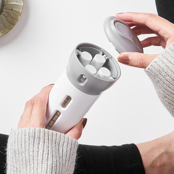 Wukusy 4-in-1 travel dispenser bottle set with refillable cosmetic containers for toiletries and liquids, compact and portable.