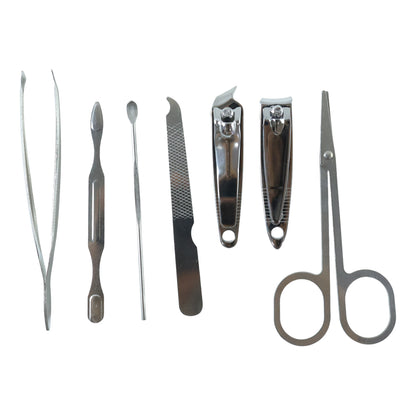Wukusy 7-in-1 stainless steel manicure and pedicure grooming kit with various nail tools arranged neatly.