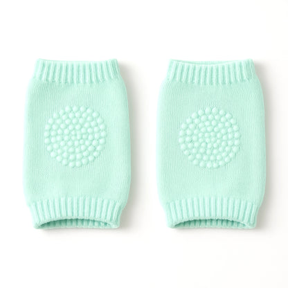 Mint green toddler wool knit leg warmer and knee guard by Wukusy, soft and cozy for baby care and knee protection.