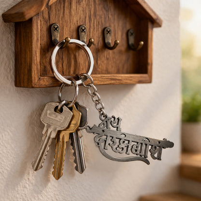 Premium metal Jay Dwarkadhish keychain by Wukusy featuring detailed craftsmanship and a shiny finish.