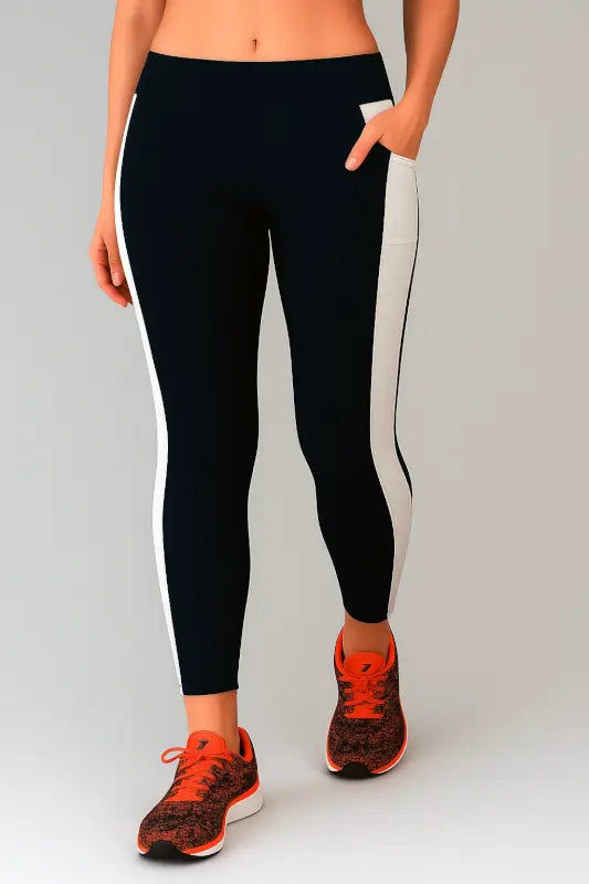 Ekom women's stretchable yoga pants with comfortable fit, ideal for gym and daily wear, shown in a natural pose.