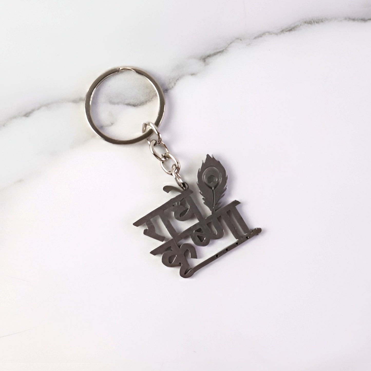 Premium Radhe Krishna metal keychain by Wukusy featuring intricate Krishna deity design on a durable metal keyring.