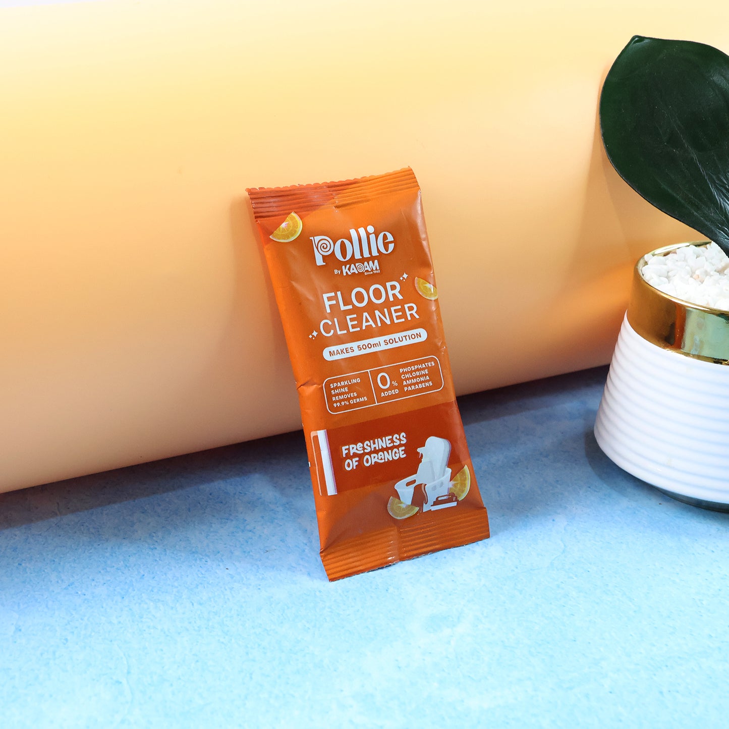 Wukusy Pollic Kadam concentrated floor cleaner sachet with orange fresh fragrance, 50g, used for effective home floor cleaning.
