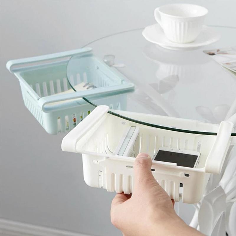 Wukusy 2336 expandable adjustable multipurpose fridge storage basket with handles for organizing fruits, vegetables, and kitchen items.