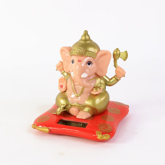Decorative medium Lord Ganesh idol statue with solar-powered base, ideal for home decor, by Wukusy.